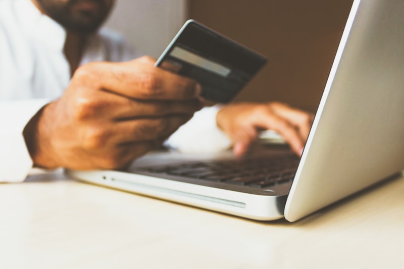 Credit score meter showing improvement, mortgage application preparation tips